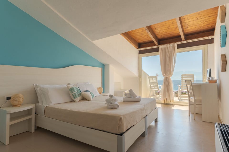 Panoramic Double or Twin Room, Private Bathroom, Sea View | Minibar, in-room safe, desk, blackout drapes