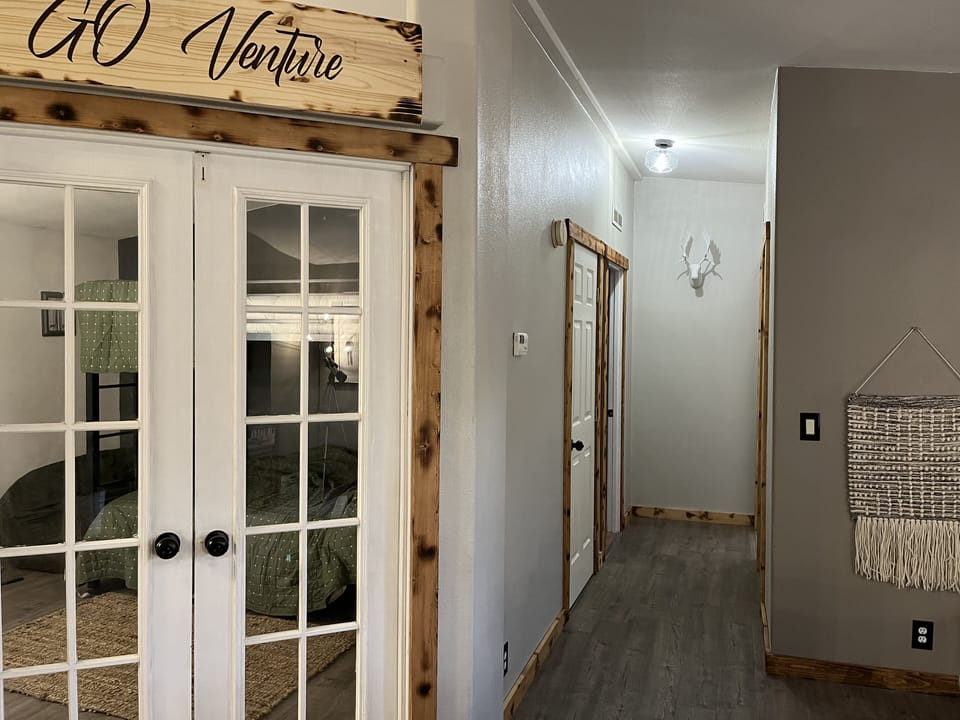 Hallway w/ bonus room: Full/Full bunks with Tv & DVD & 2 guest rooms & bathroom