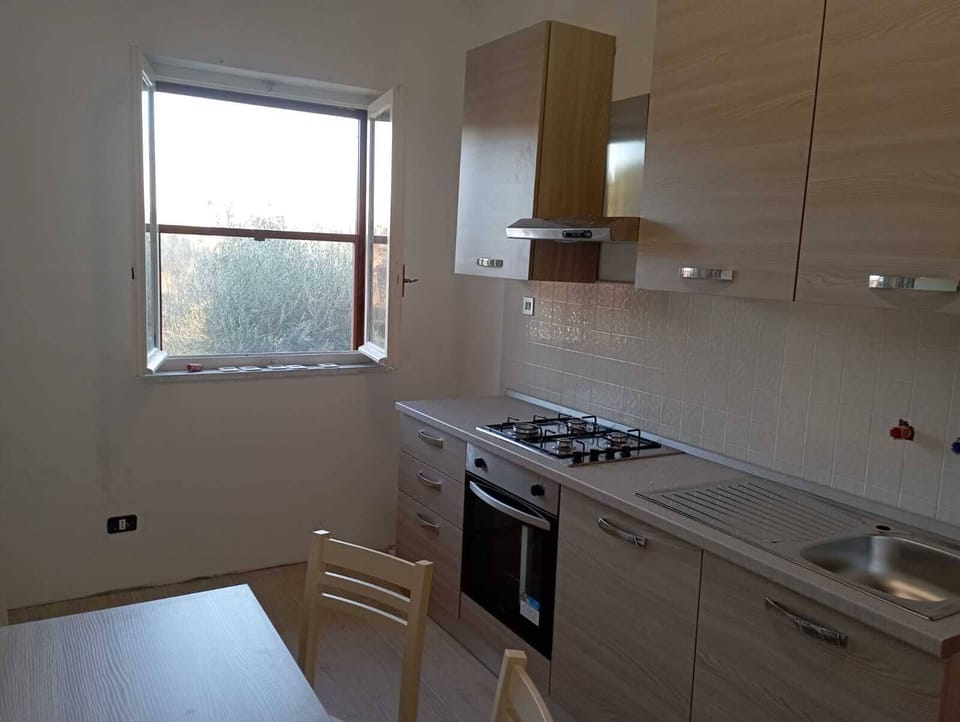 Apartment | Private kitchen | Full-size fridge, oven, stovetop, cookware/dishes/utensils