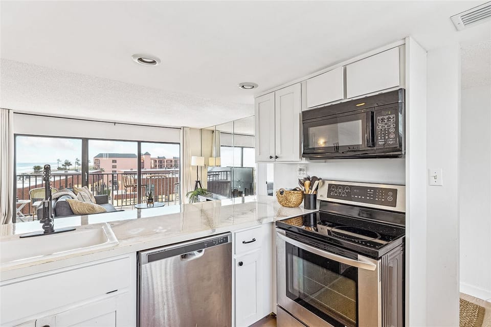 Fully stocked kitchen with ocean views and everything you need to cook