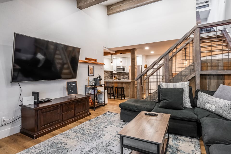 Living Room - TV, Gas Fireplace, Couch, Deck