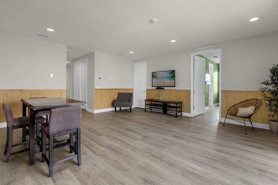 Another view of the spacious second living room with access to the other bedrooms.