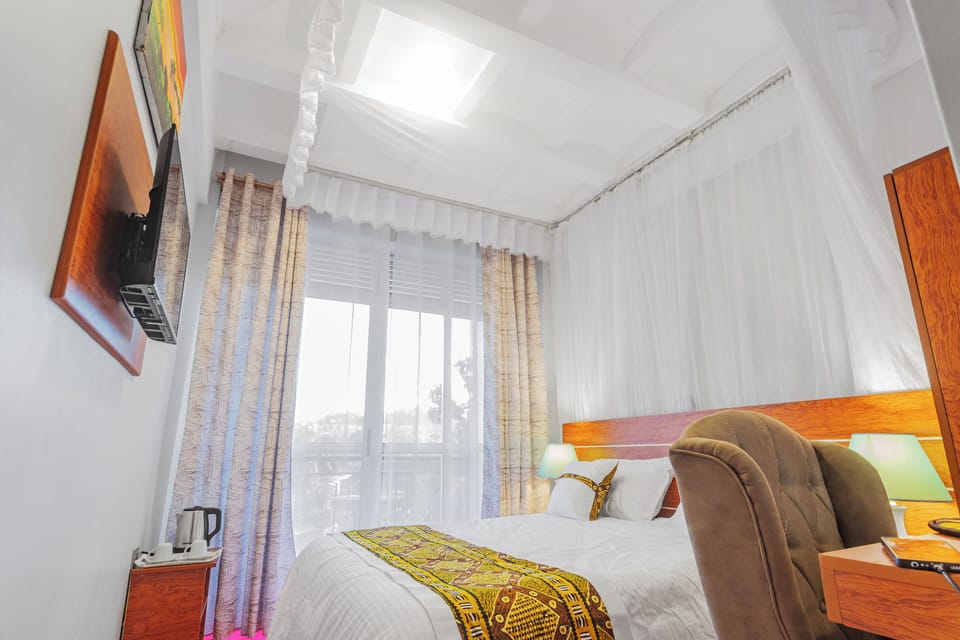 Deluxe Double Room, Balcony, Garden View | Individually decorated, desk, laptop workspace, free WiFi