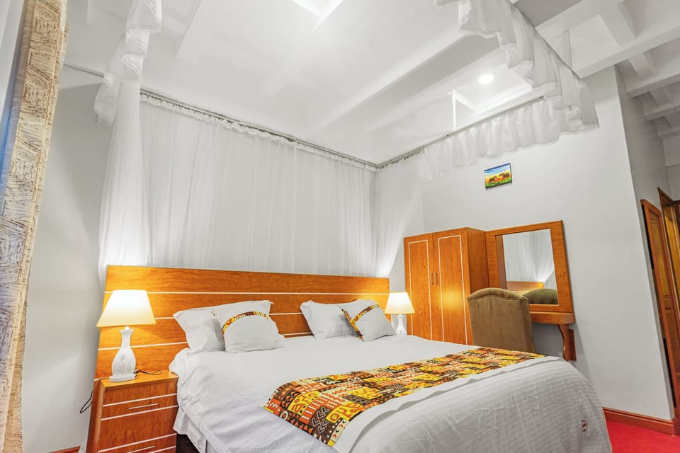 Deluxe Double Room, Balcony, Garden View | Individually decorated, desk, laptop workspace, free WiFi