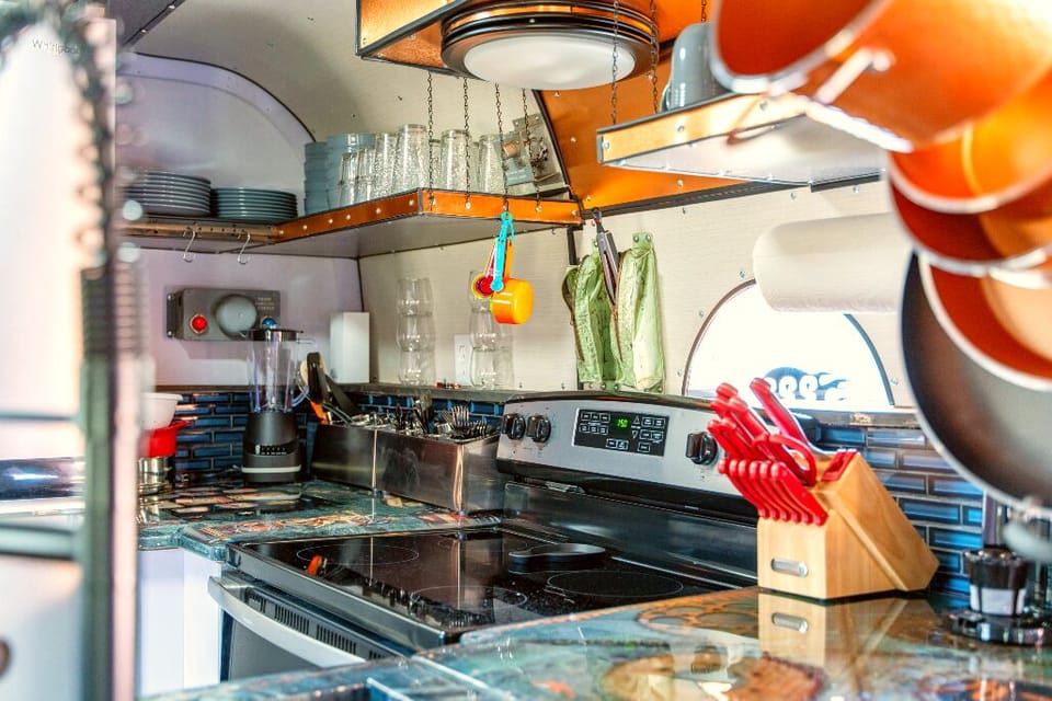 The Moto Ranch at Croom Our Chinook 2 bedroom 1 bath sleeps 6 one of a kind inside Croom motorcycle area state forest full kitchen, french door refrigerator/freezer copper sink, stove, oven, microwave, coffee maker, stocked kitchen cookware, utensils, flatware and kitchen basics 