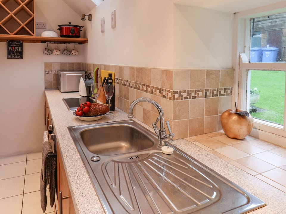 Fridge, electric kettle, toaster, cookware/dishes/utensils