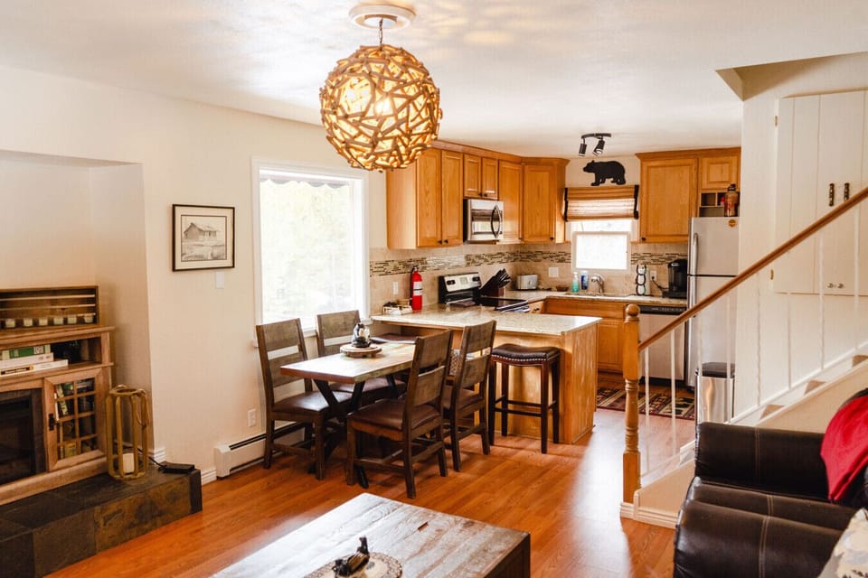 Main entrance opens up to the living room and kitchen area