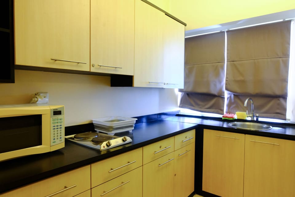 Apartment | Private kitchen | Full-size fridge, stovetop