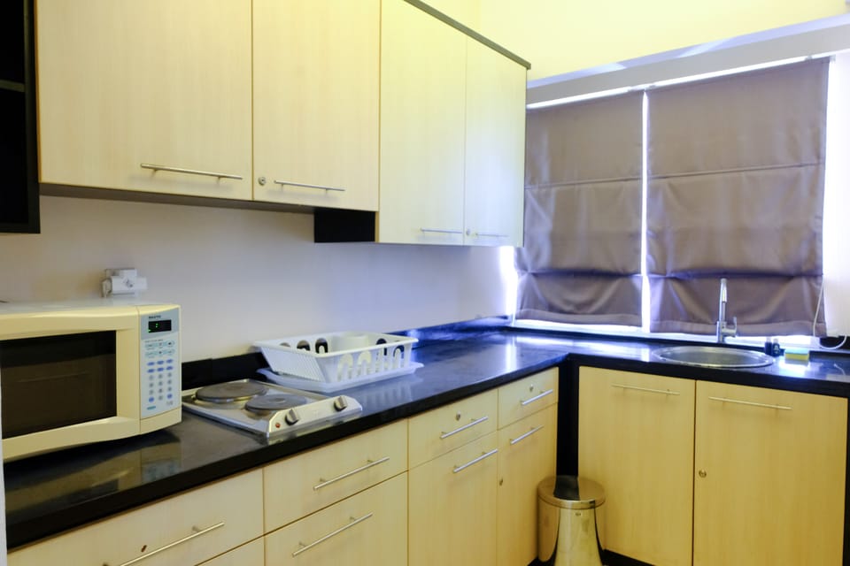 Apartment | Private kitchen | Full-size fridge, stovetop
