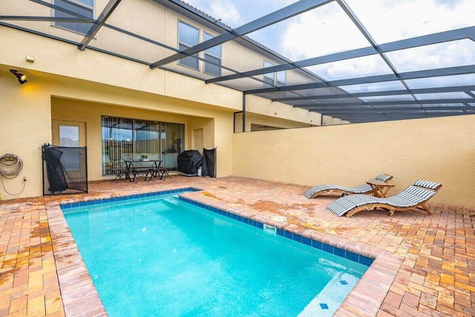 A private (heatable) pool, dining table & seating on the covered patio.