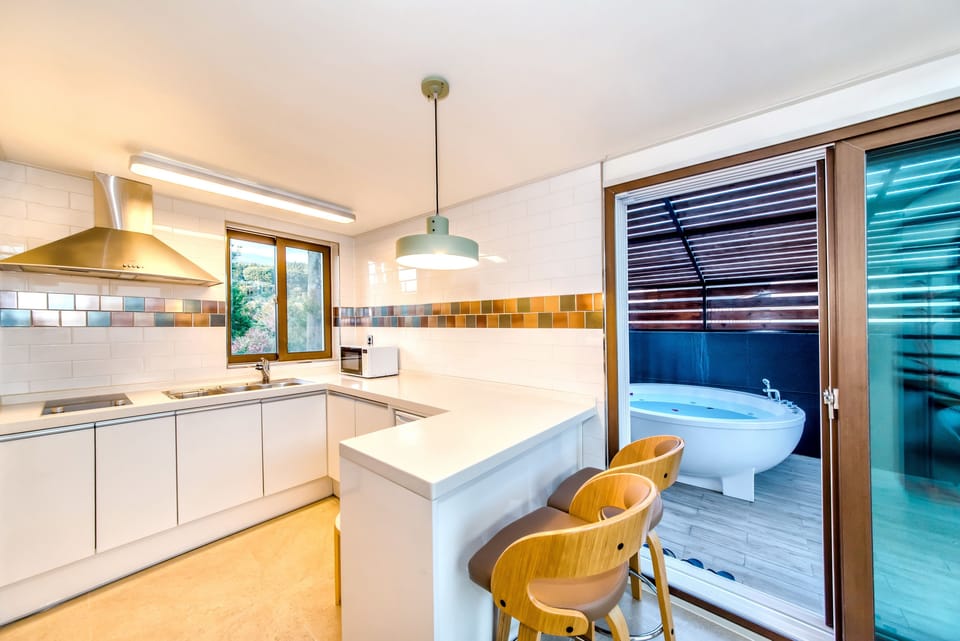 Premium Spa Room | Private kitchen | Fridge, microwave, electric kettle, rice cooker