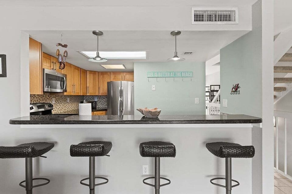 Pull up a seat at the breakfast bar for morning coffee, quick meals, or conversation while dinner is prepared.