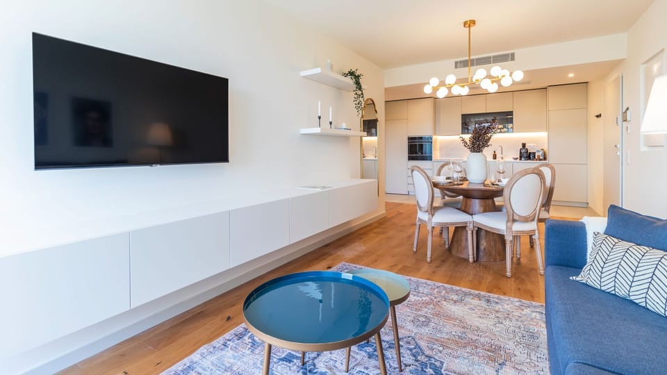 Big flat screen TV, where you can assist to your favourite tv shows, while enjoy the comfort of our couch. #comfort #lvingroom