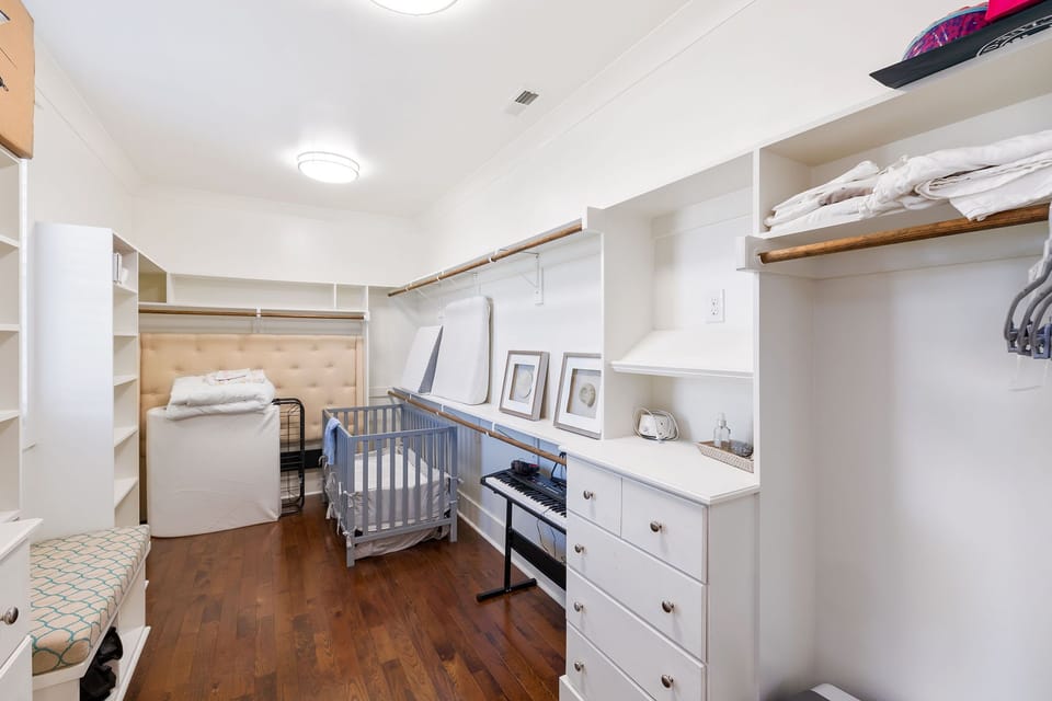 Primary bedroom #1: spacious walk-in closet w crib