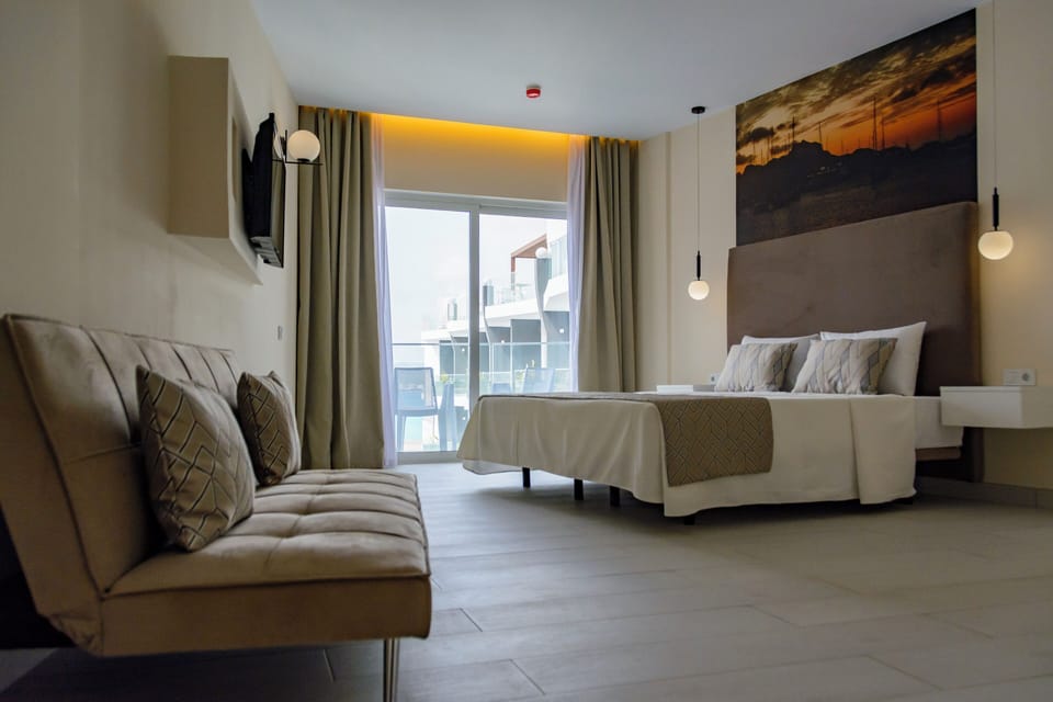 Superior Family Room | Minibar, in-room safe, desk, free WiFi