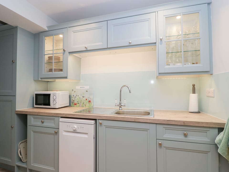Fridge, electric kettle, toaster, cookware/dishes/utensils