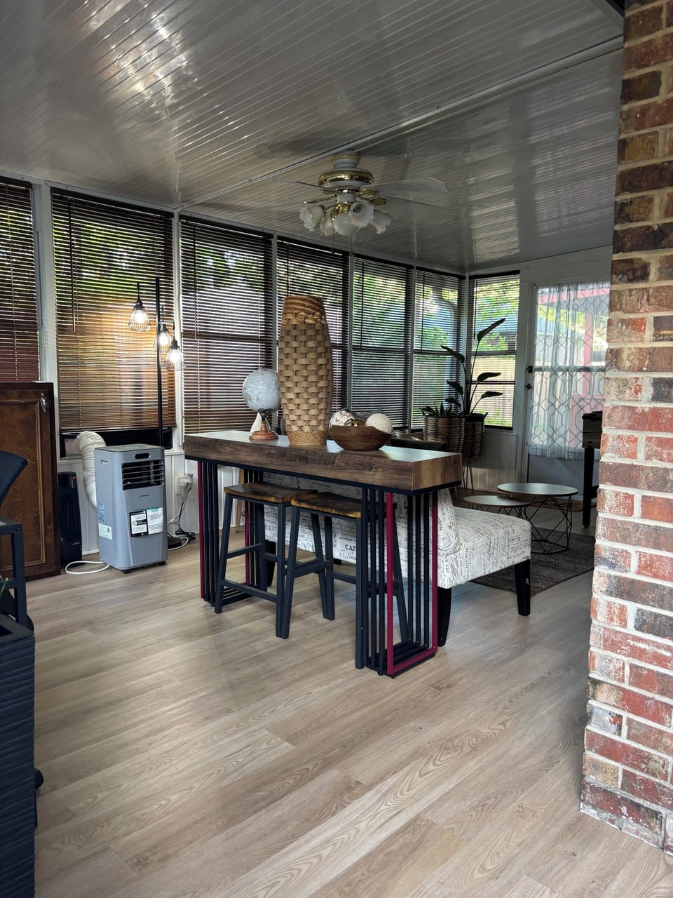The sun/bonus room which doubles as an entertainment space.
