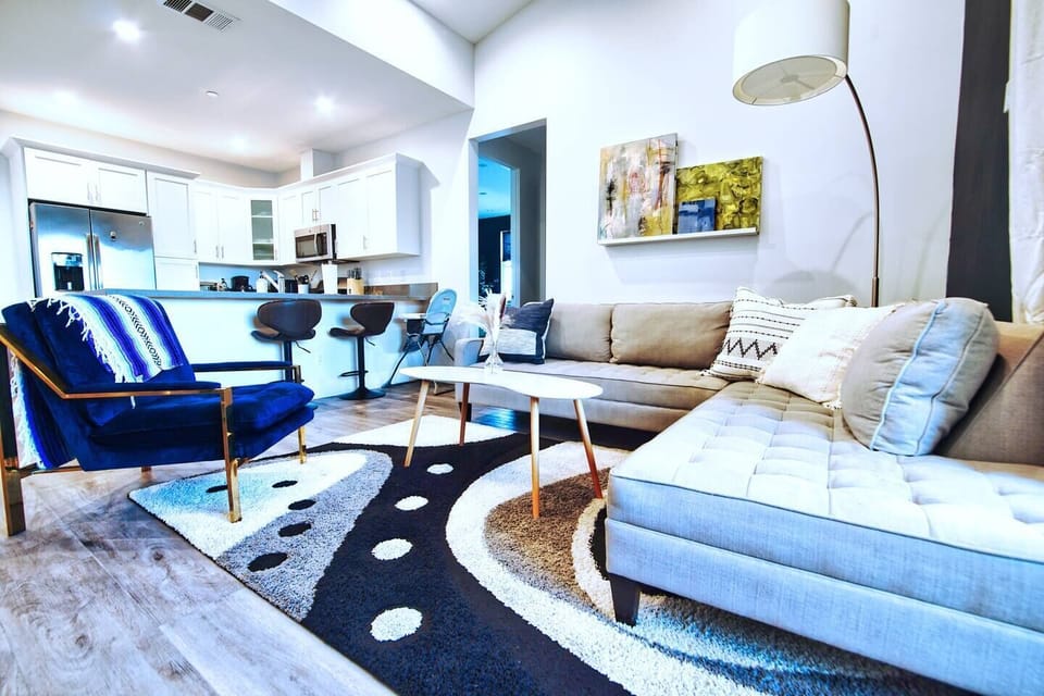 Modern and Luxurious Living room with Smart TV, private balcony, and brand new appliances!