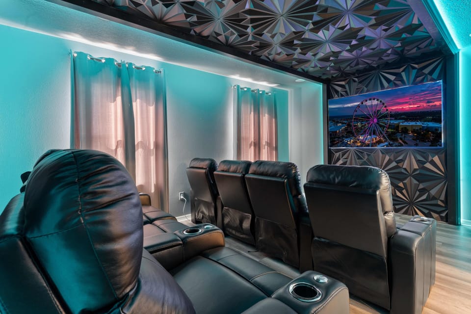 - Private theater with reclining chairs and big screen display  
- Cozy lighting and surround sound for immersive movie nights  
- Entertainment hub for families friends and vacation fun