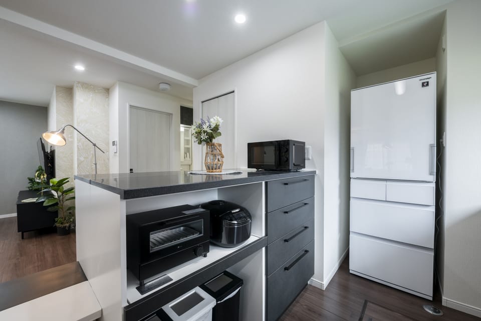 Royal Villa | Private kitchen | Full-size fridge, microwave, stovetop, dishwasher