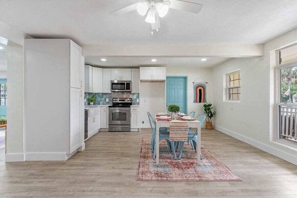 REFRIGERATOR INCLUDED with water dispenser, but not shown. Open concept kitchen & dining room!