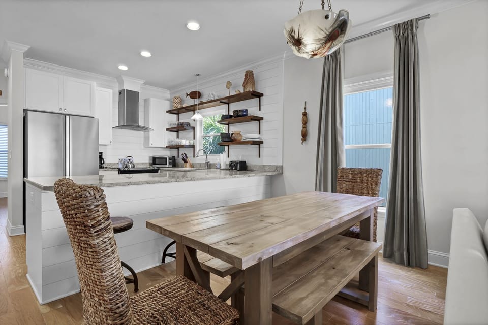 Plenty of seating in the dining room and at the kitchen bar