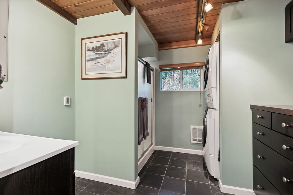 Bathroom has heated floors and a standing shower