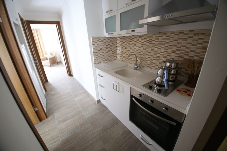 Standard Apartment, Kitchen | Private kitchen | Fridge