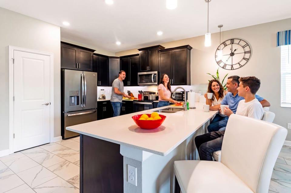 Spacious kitchen with large island, great for meals, snacks, and gathering