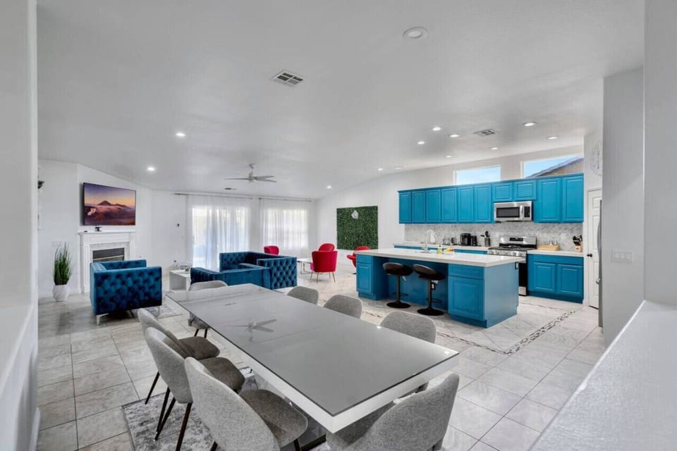open-plan layout with a vibrant kitchen and cozy living space.