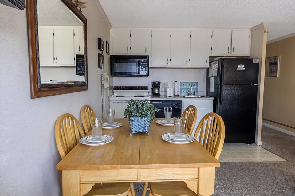 Cozy kitchen and dining area perfect for family meals.