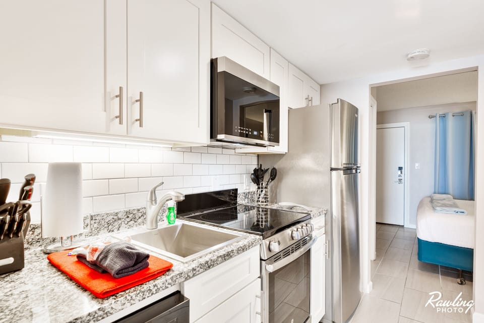 All new cabinets, granite, stainless steel appliances and Keurig breakfast bar.