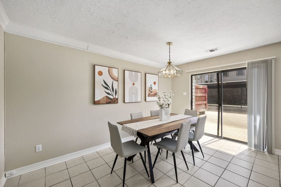 Dining area with sliding doors leading outside—perfect for easy indoor/outdoor flow