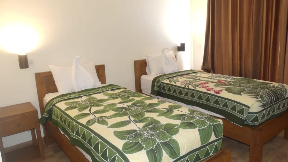 Standard Room, 1 Bedroom, Balcony, Ground Floor | In-room safe, individually decorated, individually furnished, free WiFi