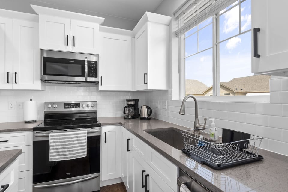 Fully renovated kitchen with quartz countertops