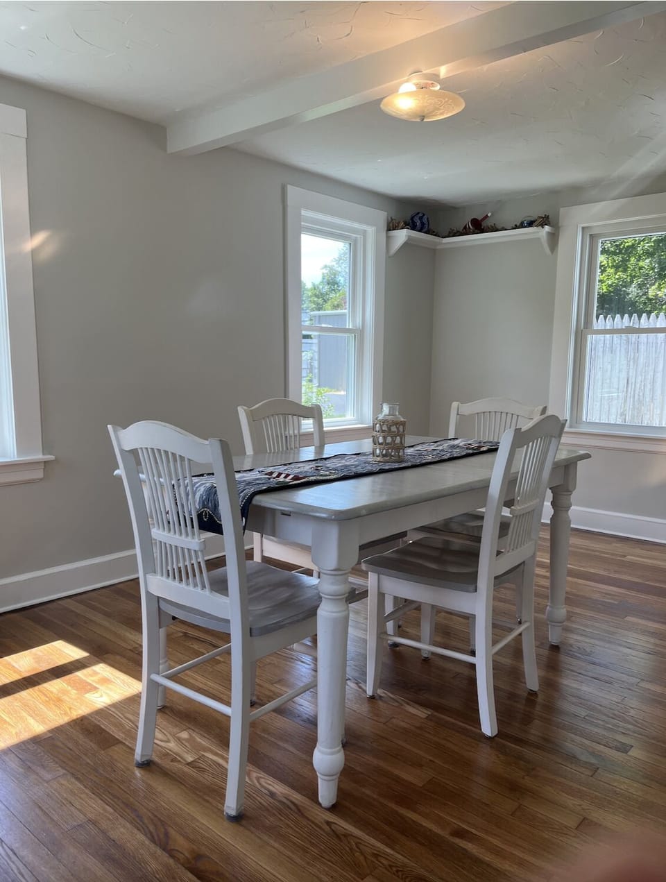 The 6-person dining table extends to host additional guests