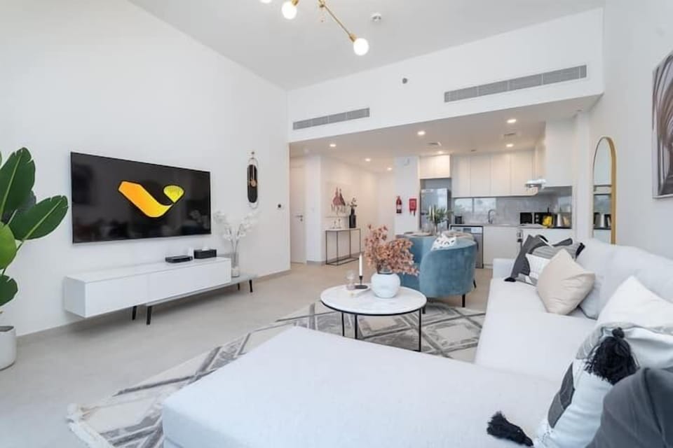 Luxury Apartment | Living area | 65-inch Smart TV with cable channels