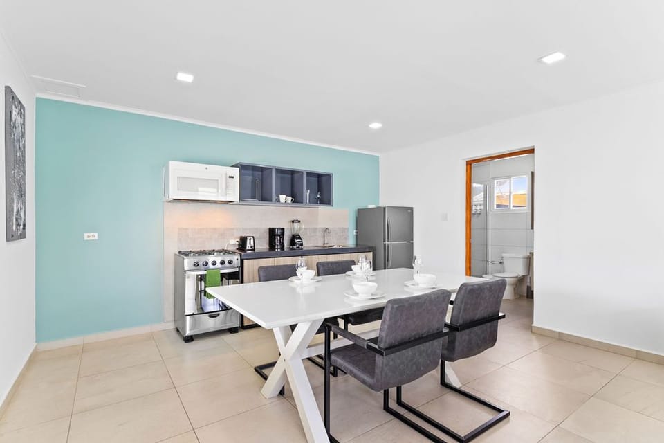 Our studio unit boasts a small kitchenette equipped with all the essentials, allowing you to prepare delicious meals and enjoy dining in the comfort of your own space.
