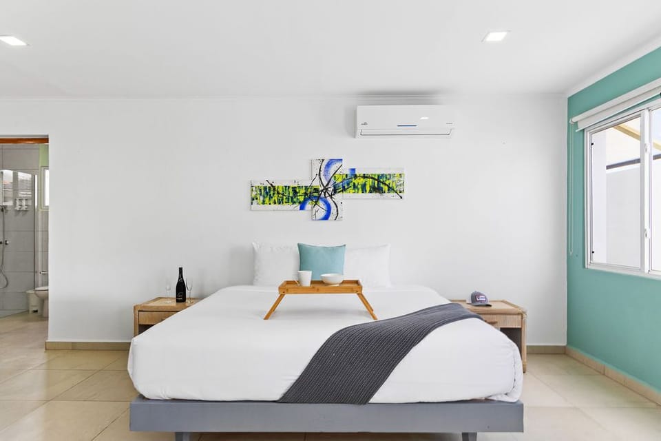 Discover a haven of comfort and convenience in our stylish studio, featuring a spacious king bed, TV, and refreshing AC.