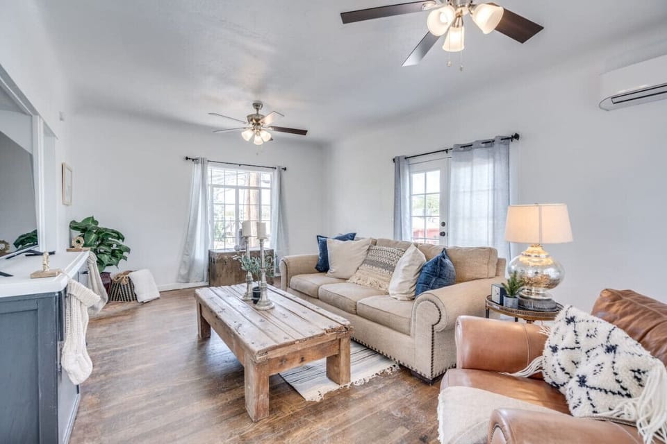 Large living room with lots of natural light