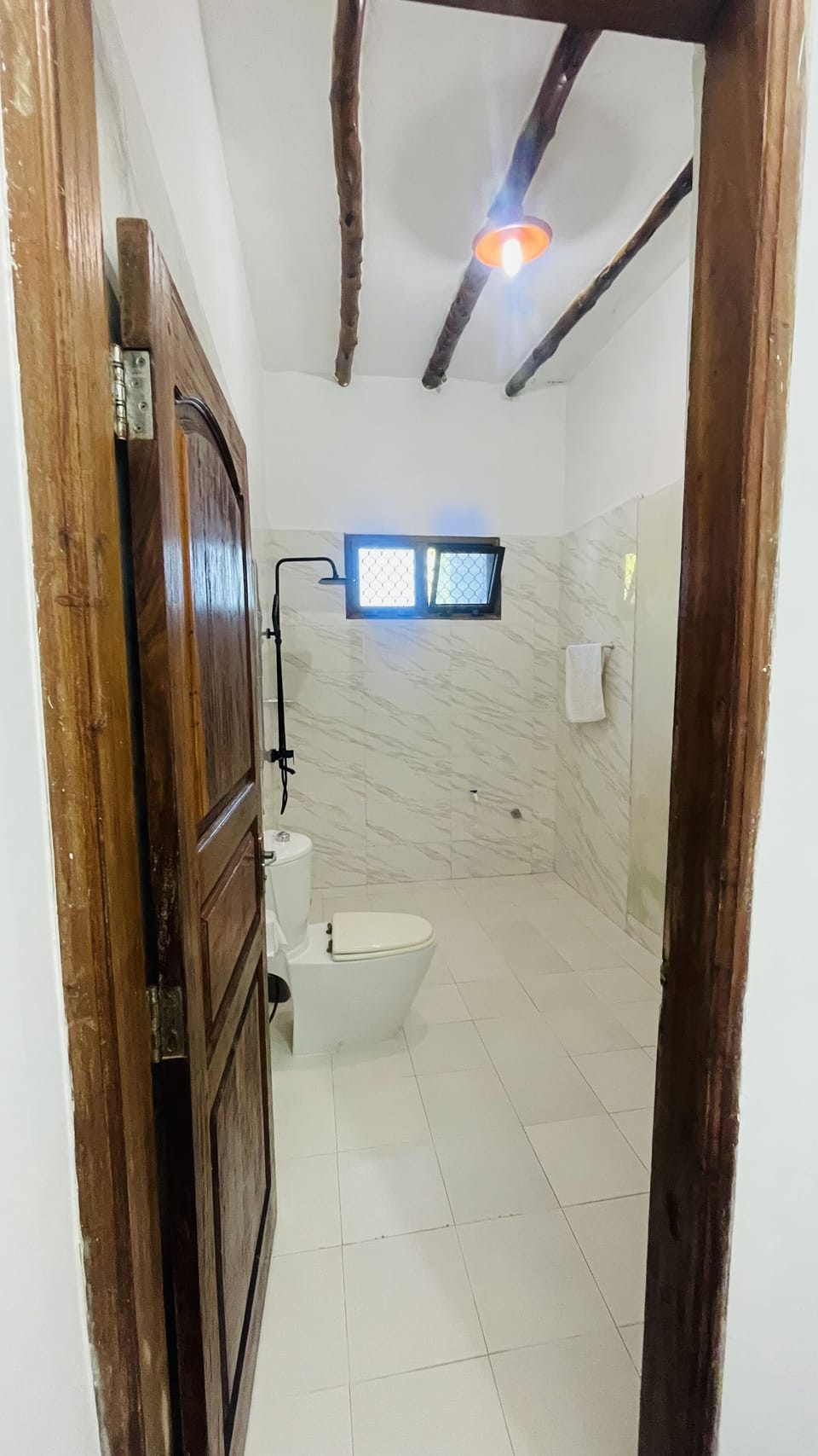 Deluxe Double Room, Ocean View | Bathroom | Shower, rainfall showerhead, bidet, towels