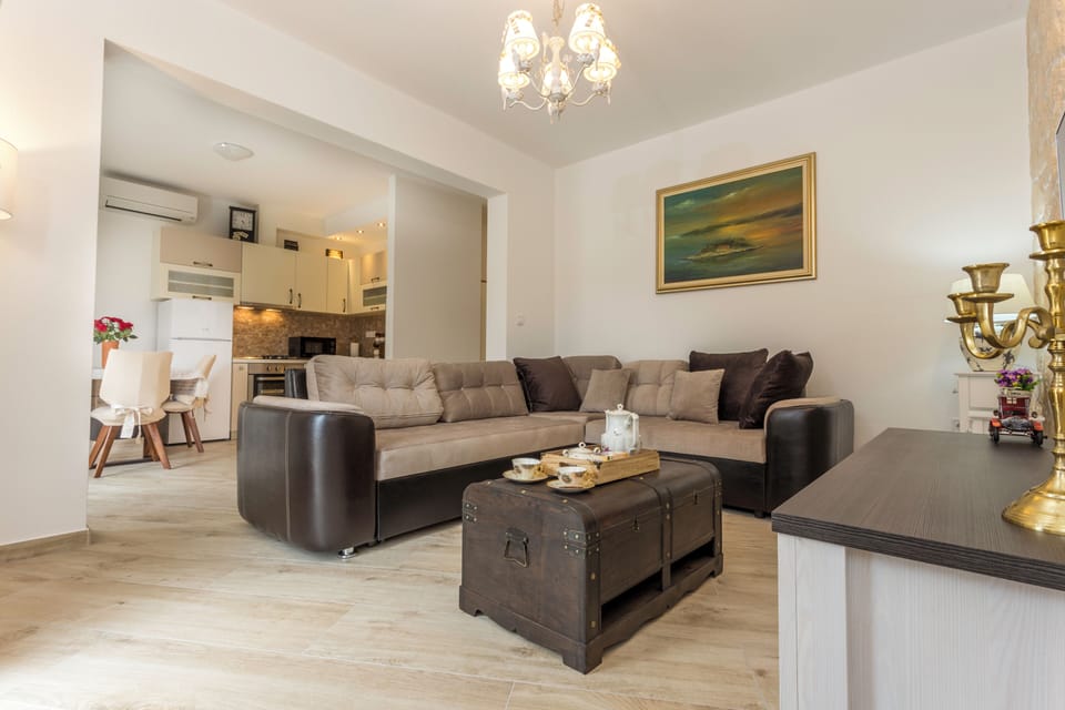 Luxury Apartment With Swimming Pool | Living area | 110-cm Smart TV with satellite channels, streaming services