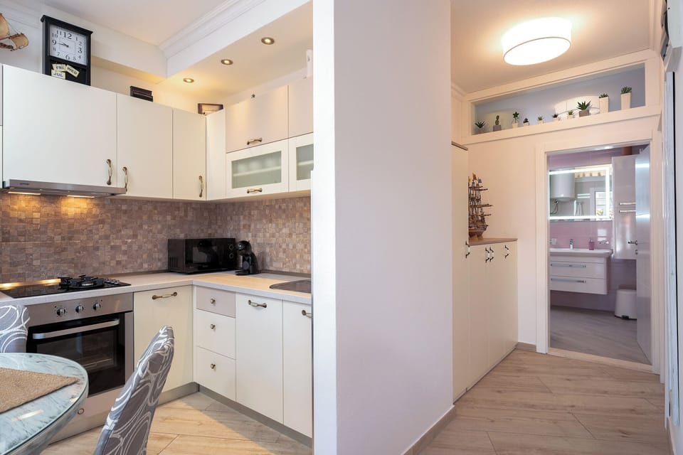 Luxury Apartment With Swimming Pool | Living area | 110-cm Smart TV with satellite channels, streaming services
