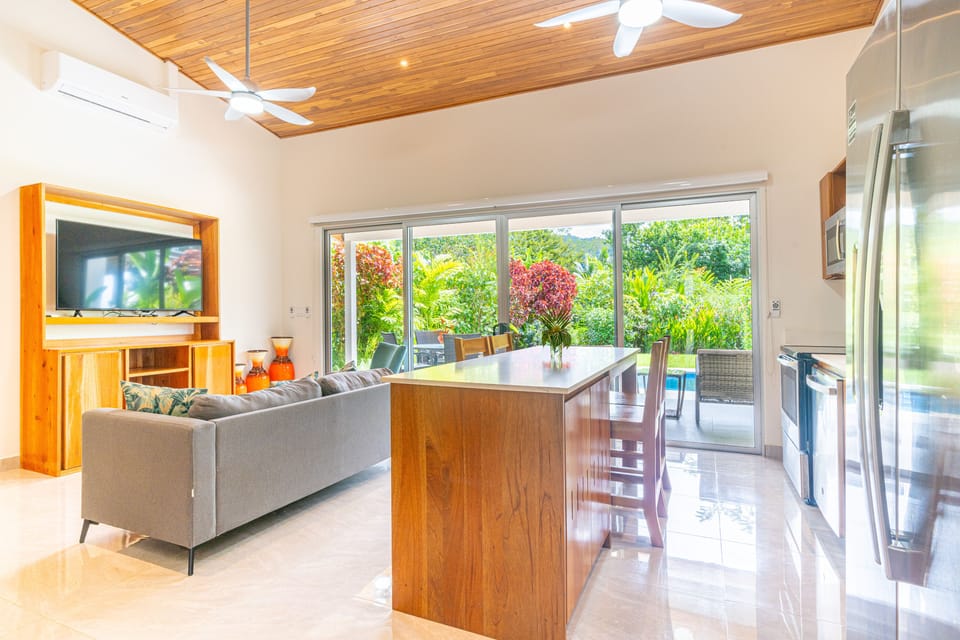 Open floor plan with nice layout of kitchen, TV area and private pool and easily accessible. 