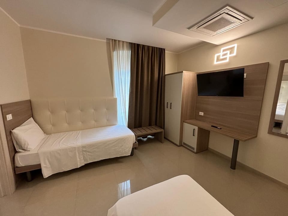 Superior Quadruple Room | Premium bedding, down comforters, in-room safe, desk