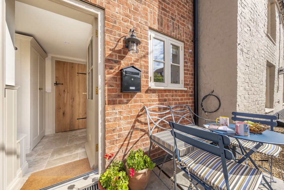The entrance to the cottage from the courtyard