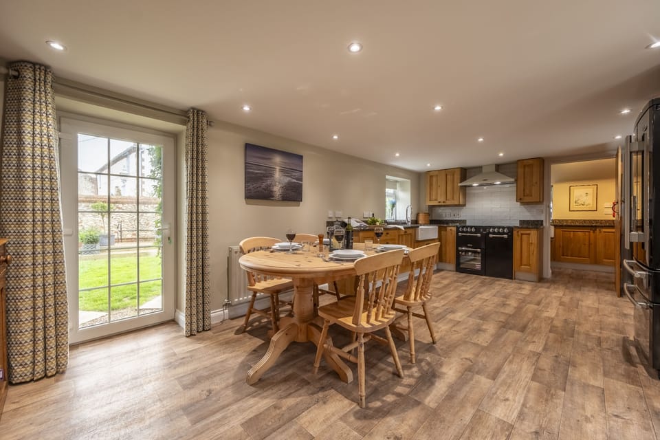 Ground floor: Kitchen and dining room with access to the enclosed garden