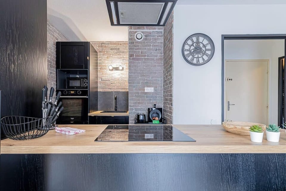 Cuisine entièrement équipée : La cuisine de l'appartement est équipée d'une...
