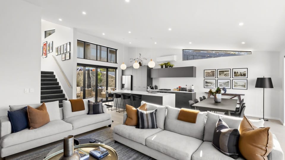 Open plan living with high ceilings