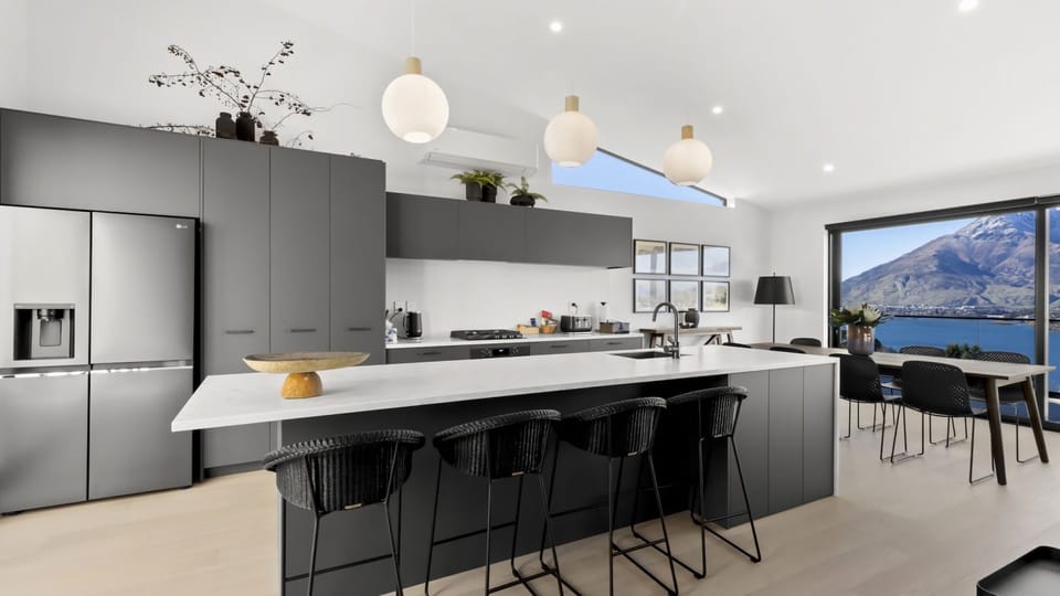 Fully equipped kitchen with breakfast bar and dining for 8